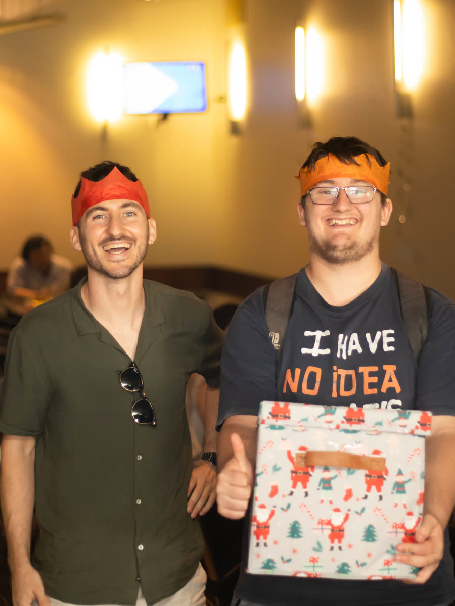 Friends sharing gifts at Secret Santa