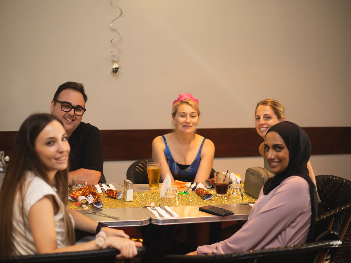 Friends enjoying dinner together